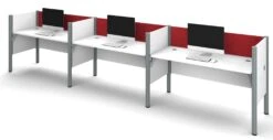 White Three-Desk Workstation With Red Tack Board