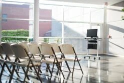 Luxor 30" Black & White Mobile Adjustable Workstation Or Office Desk -Home Decor Shop stand ws30 adjustable stand up workstation three shelf black shelf white frame propped environment 5 1